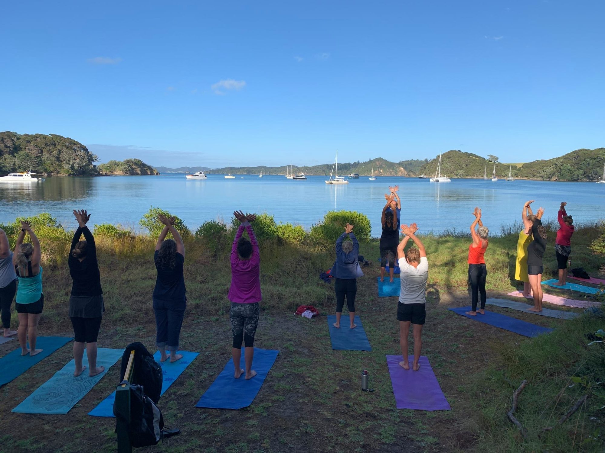 Guests on the deck of The Rock cruising the Bay of Islands