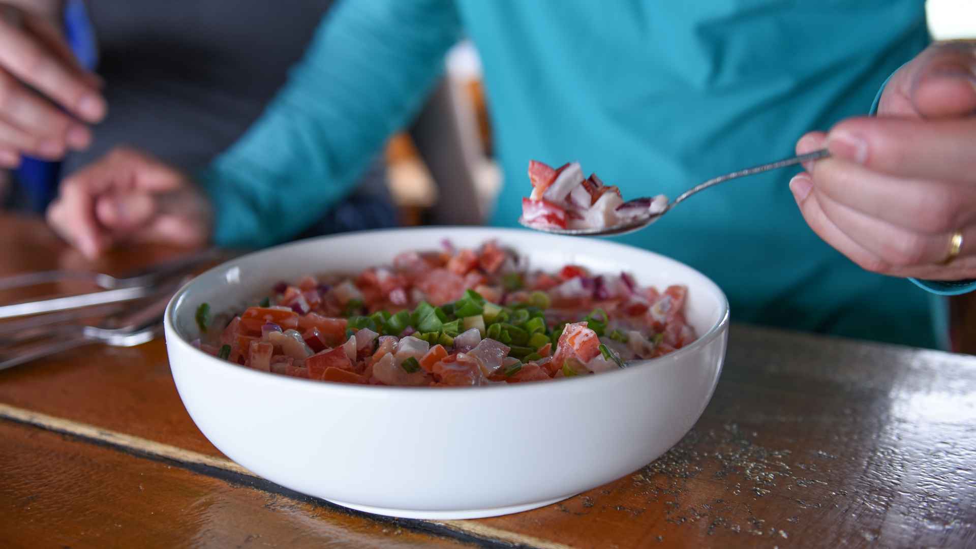 a bowl of fresh kahawai ceviche