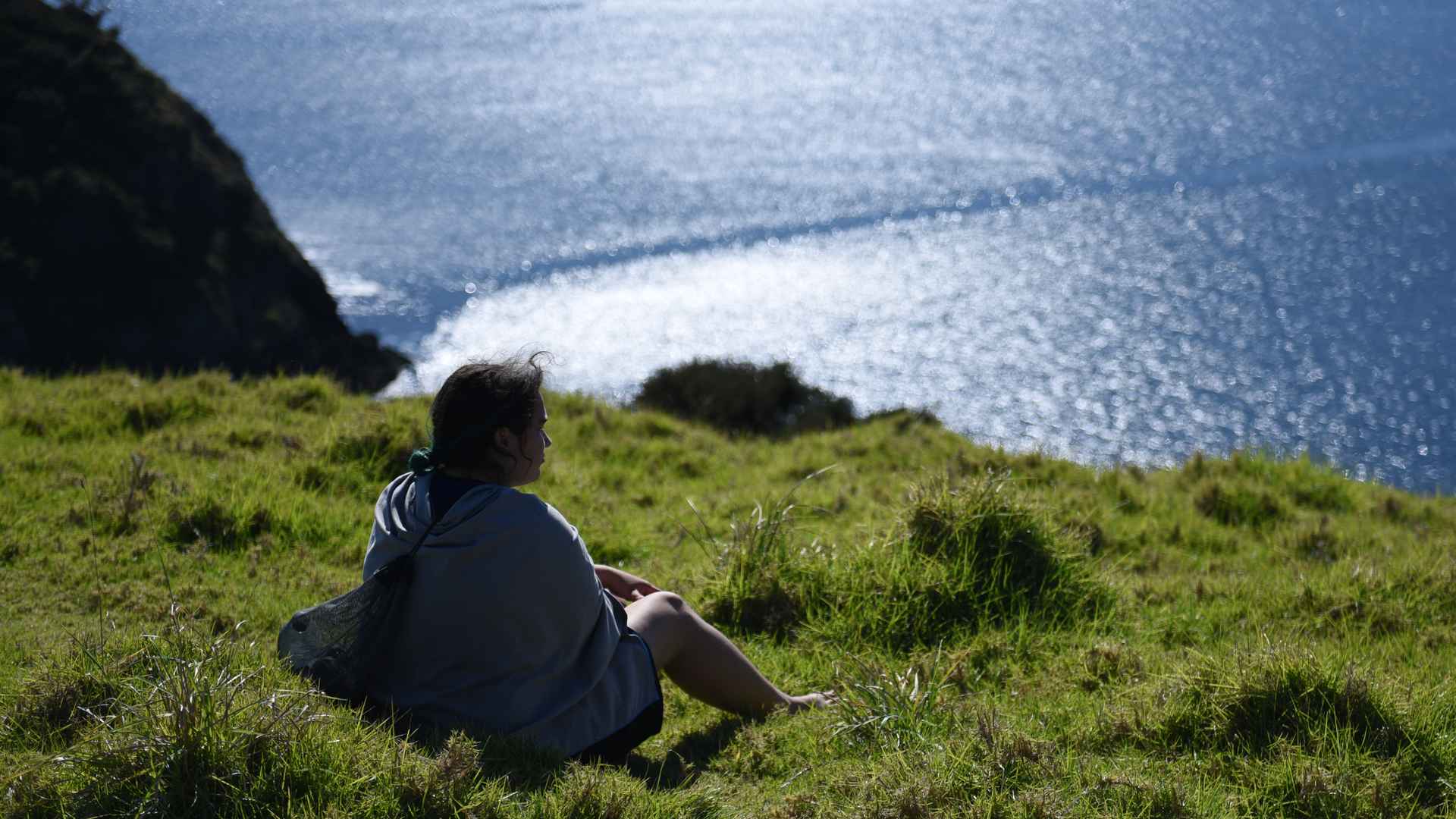 lady finding inner peace at waewaetorea island bay of islands new zealand