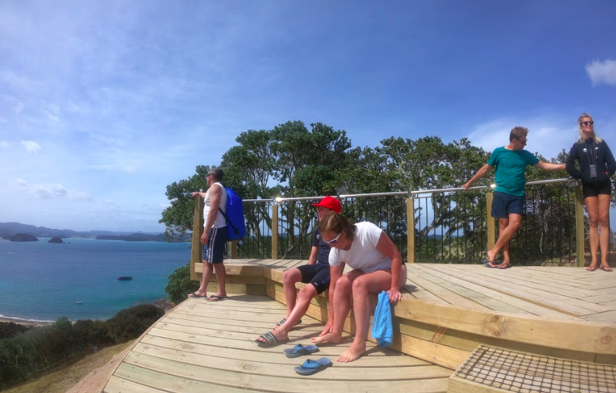 at the top of roberton island after a hike