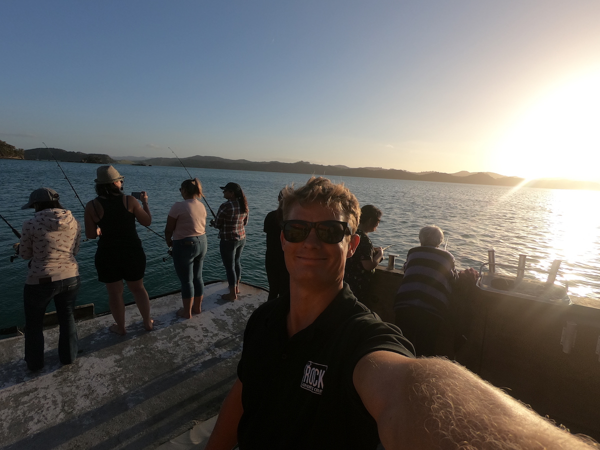 Cruising with sunset on the back at the rock adventure cruise bay of islands