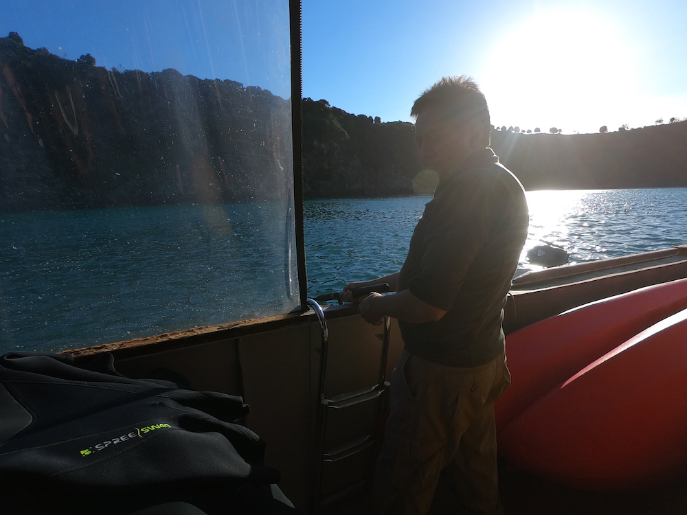 guest fishing off side of The Rock