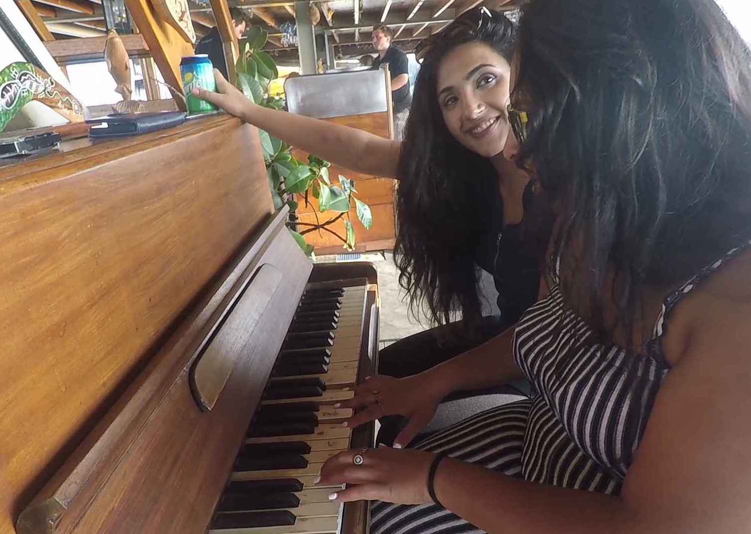 girls playing piano in the rock adventure cruise 
