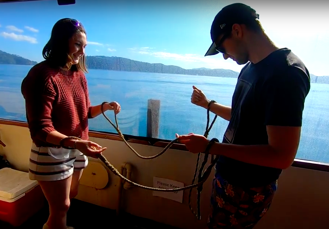 tying a knot at The Rock Adventure Cruise