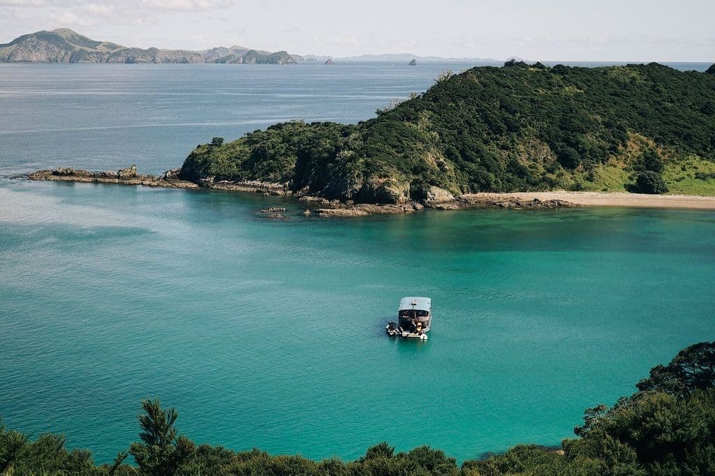The Rock anchored in a seclusion in the Bay of Islands