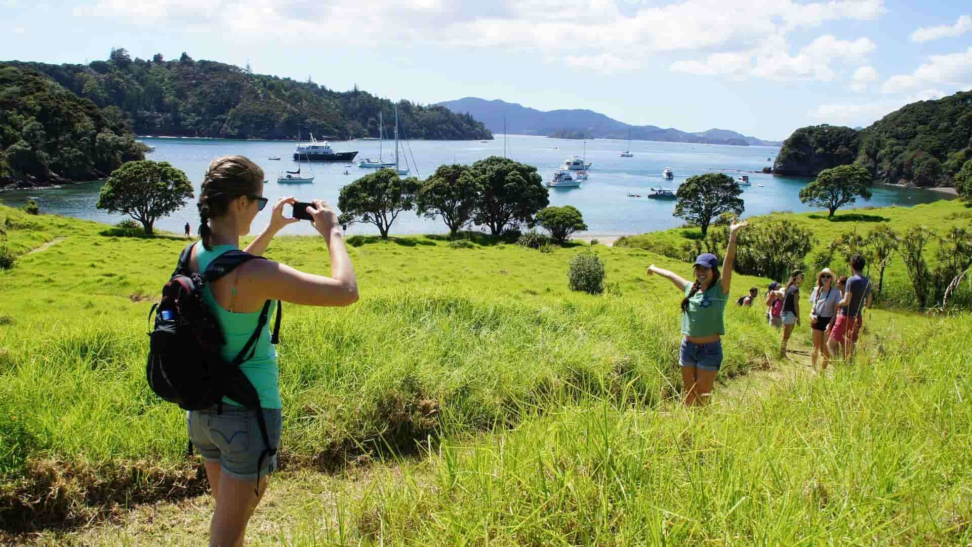 Looking over the Bay of Islands with The Rock Adventure Cruise in the foreground