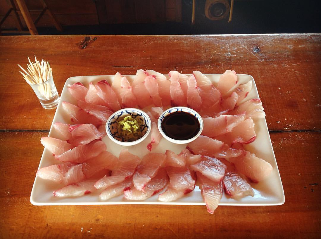 Fresh kingfish sashimi served at The Rock