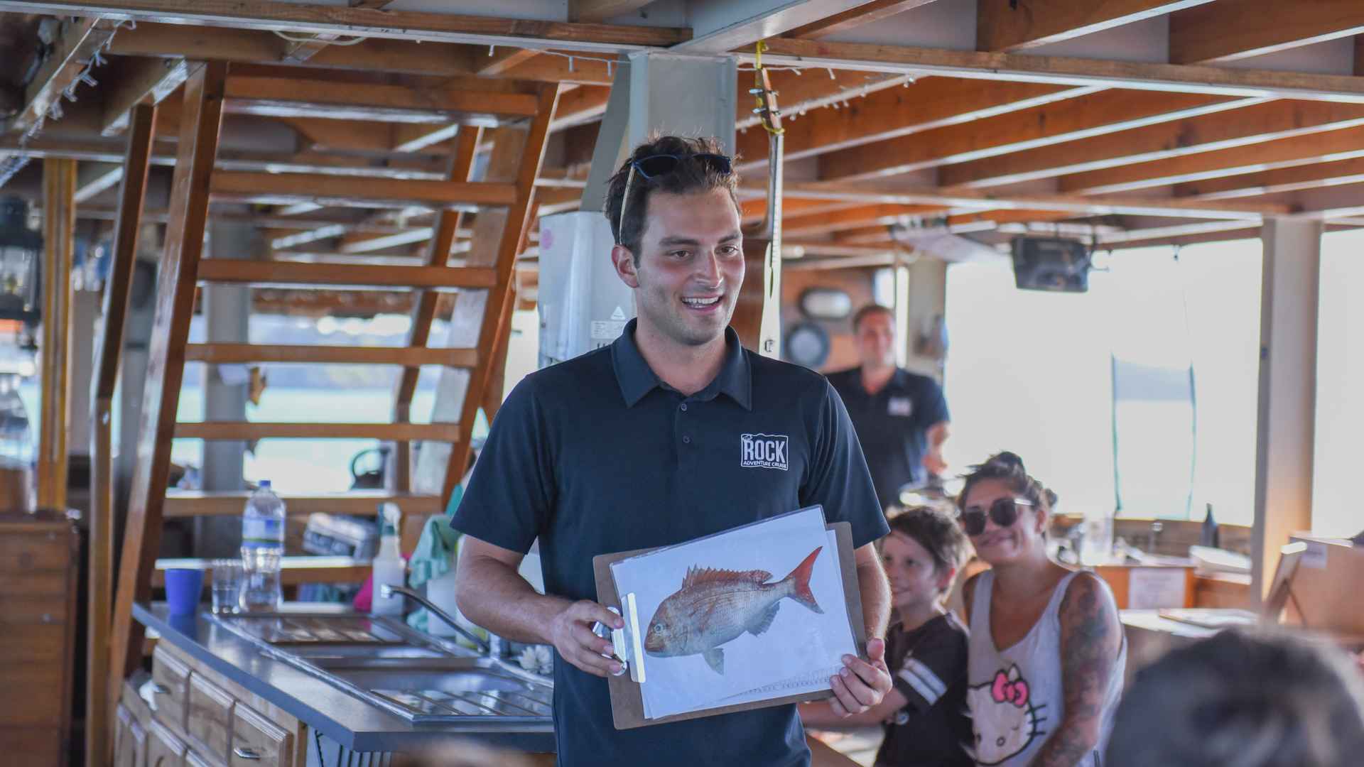 Austin showing the local kiwi marine life 