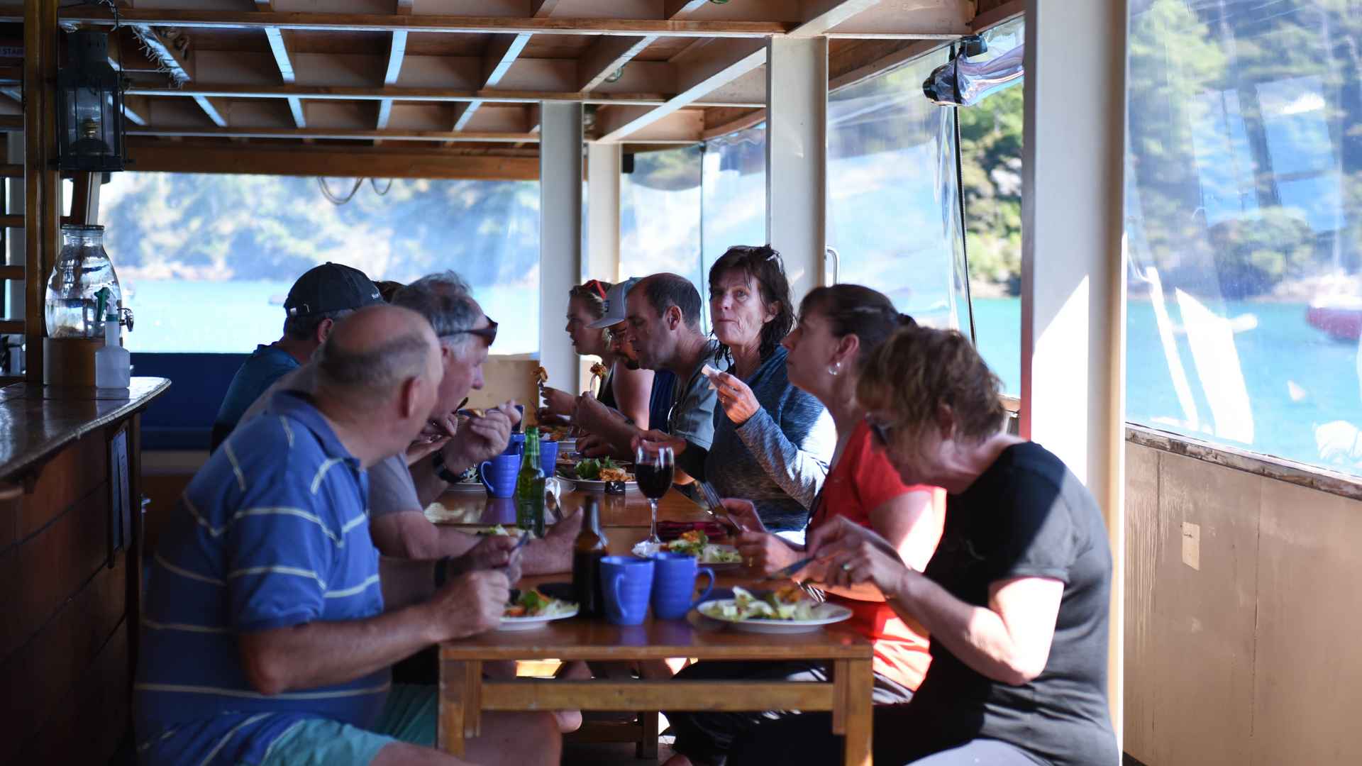 enjoying lunch at the bay of islands aboard the rock cruise adventures