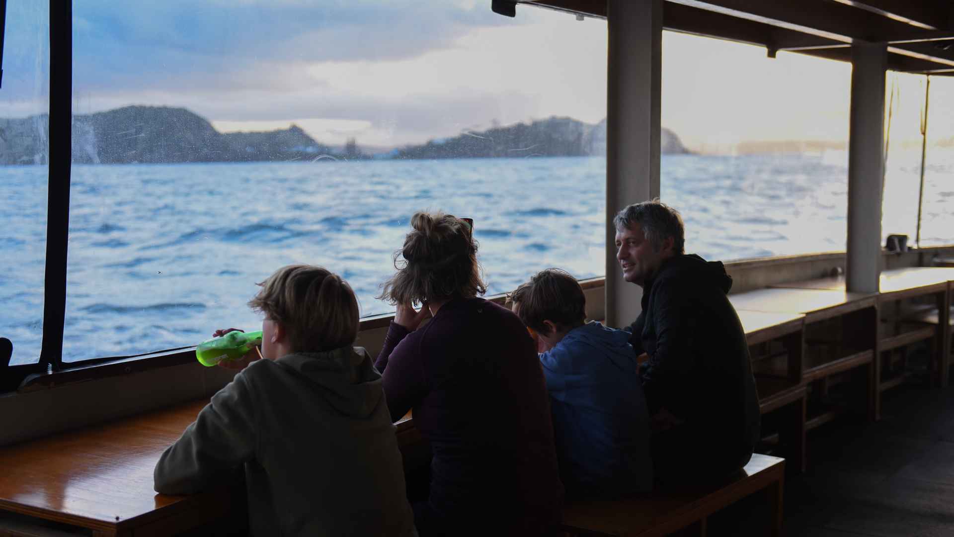 family enjoying the view at the rock bay of islands
