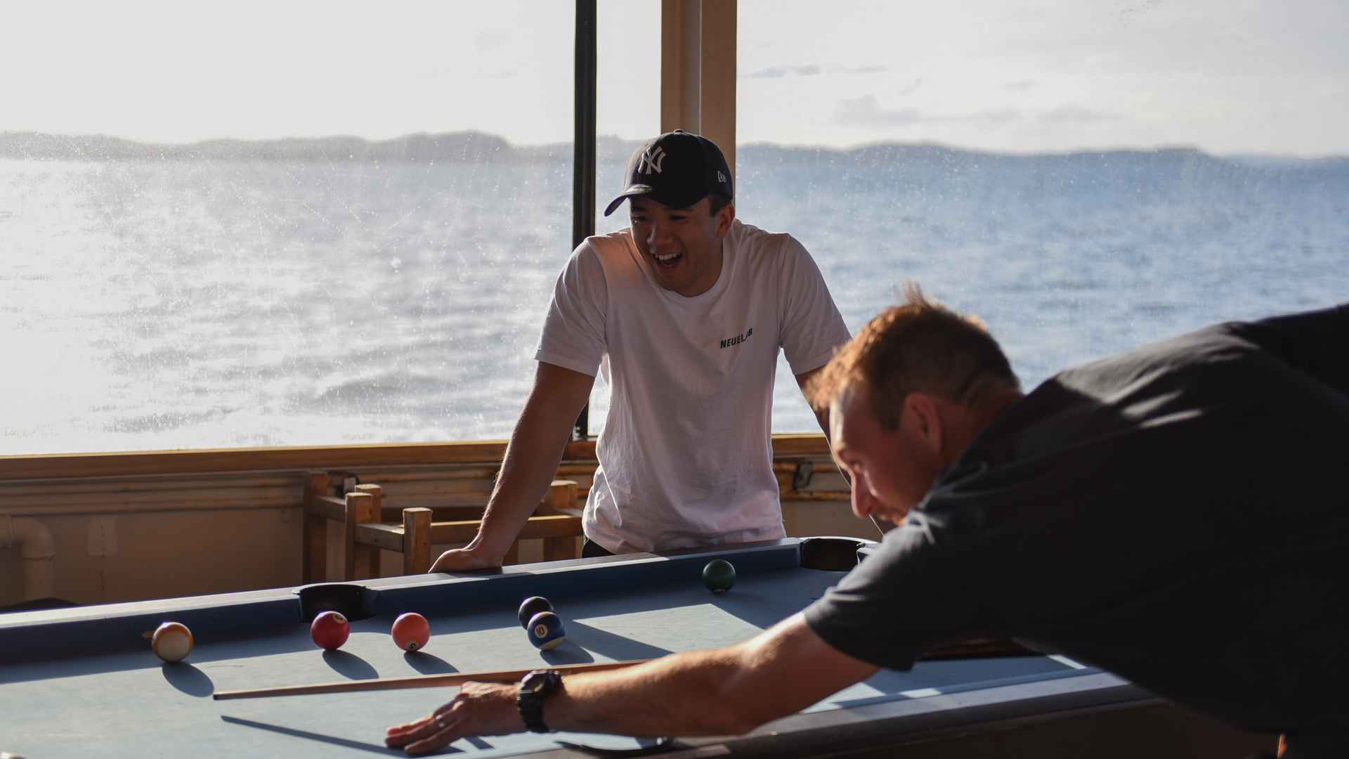 The Rock crew serving drink on The Rock Cruise